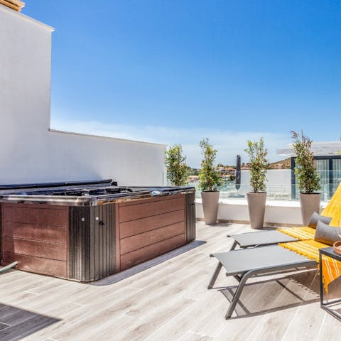 Settle into the warm opulence of the hot tub for pure relaxation