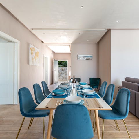Gather your group for a celebratory dinner around the stylish dining table