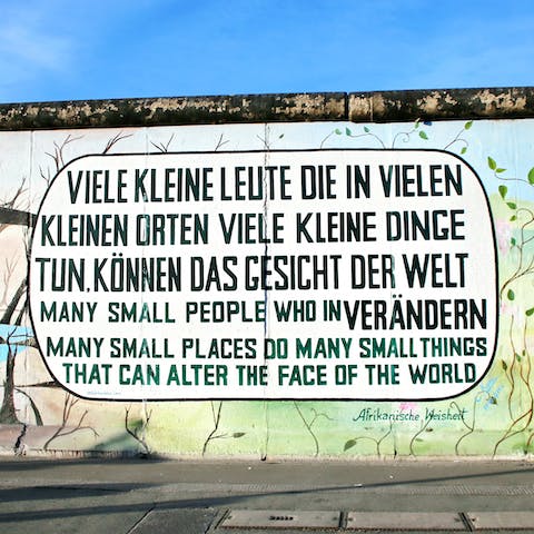 Admire the murals of the East Side Gallery, located right across the street