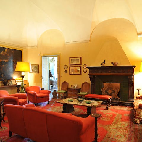 Admire an interior of rich oil paintings and original fireplaces