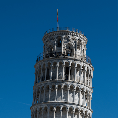 Visit the iconic Leaning Tower of Pisa, a ten-minute drive away