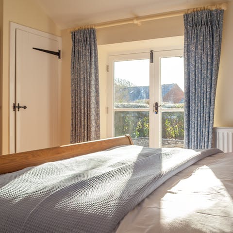 Open up the French doors from the bedroom to let in some fresh, sea air