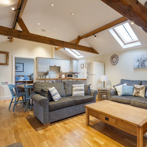 Admire original features of the farmhouse, such as rustic timber beams