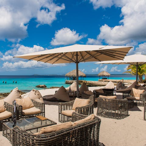 Lounge on the beach in the cosy chairs