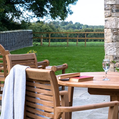 Spend sunny evenings out in the garden, soaking up the far-reaching views