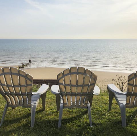 Breathe in the fresh sea air while basking in the sun in the elevated garden overlooking Mundesley Beach  