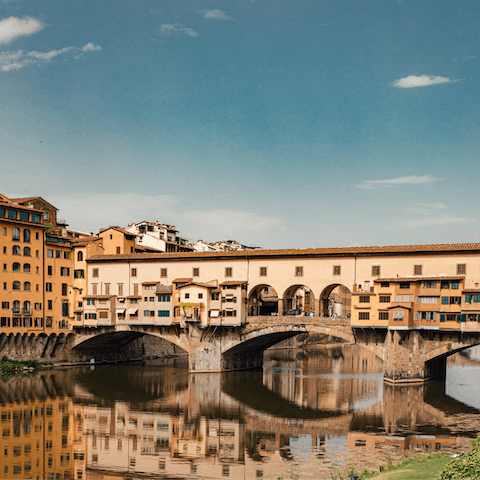 Take an evening amble along the Ponte Vecchio – it’s just footsteps away