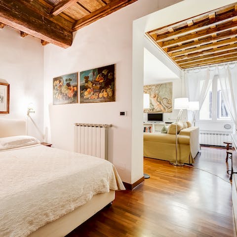 Admire the traditional architecture of beamed ceilings throughout the home