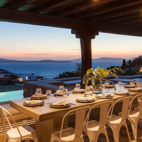 Gather round the outdoor dining table for a delicious Greek-inspired meal