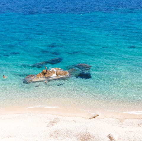 Walk just ten minutes to reach Mykonos' sparkling waters at Paralia Agios Ioannis