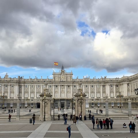 Visit the Royal Palace of Madrid, a fifteen-minute drive from your building