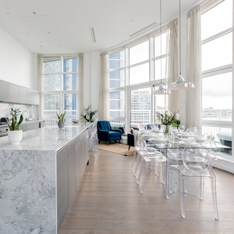 Dine together in this sun-soaked penthouse