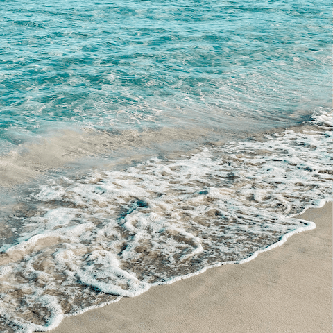 Spend the afternoon at Cala Jondal Beach, just a short stroll away