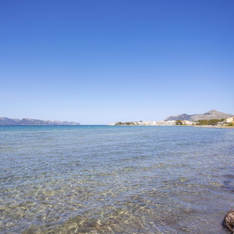 Step straight onto the shoreline from this home on the bay of Pollensa
