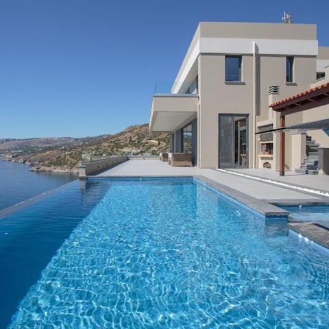 Cool off from the Cretan sun with a dip in the infinity pool 