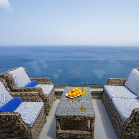 Enjoy a refreshing drink on the elevated terrace in blissful serenity 