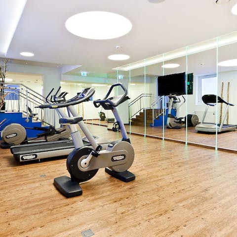 Stay on top of your fitness goals in the communal gym 