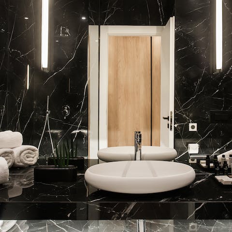 Get ready in the sumptuous marble bathroom before a night out