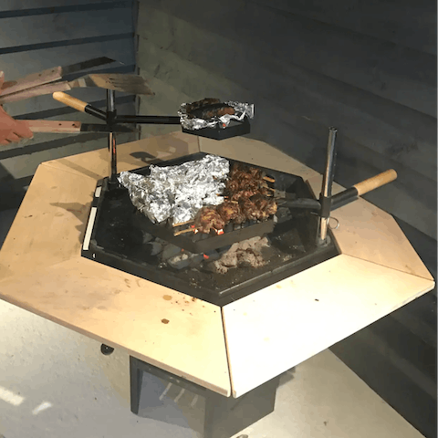 Light the indoor barbecue in the summer house for a unique dining experience