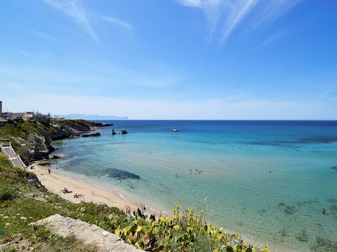 Spend days on the sandy beach of Magaggiari – just 1km away