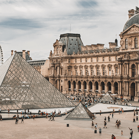 Explore one of the world's most impressive art collections at the emblematic Louvre Museum – a twenty-minute walk away