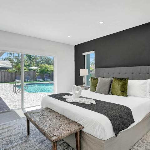 Wake up to the blissful Florida sunshine and views out onto the garden's pool