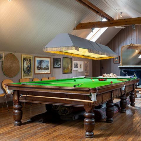 Stoke up a fierce rivalry on the billiards table in the games room