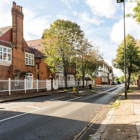 Wander through tree-lined streets to Chiswick High Road's cafes