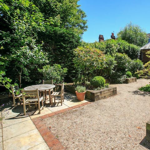 Drink in morning sunshine and enjoy coffees in the private garden