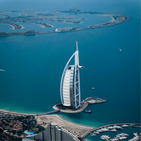 Look out over the artificial islands and sparkling sea from your JBR apartment