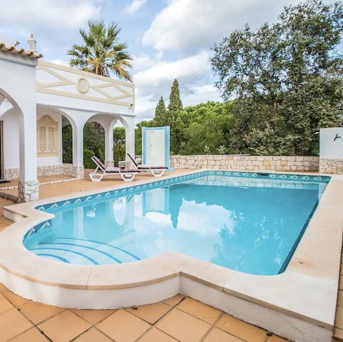 Watch the kids splash about in the private pool