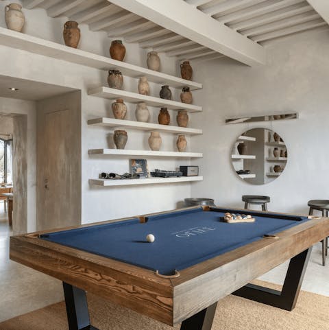 Enjoy an evening game on the custom-made pool table