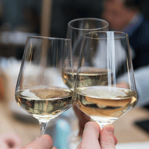 Indulge in a glass or two of wine at one of the many bars in De Waterkant