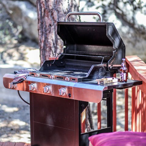 Fire up the grill for a barbecue amidst the towering tree tops