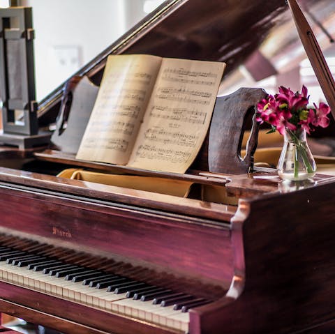 Play a sonata on the grand piano in the main lounge