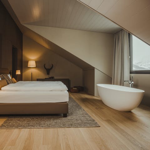 Unwind with a bath in the master bedroom