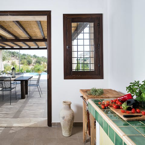 Read up on the best Sicilian recipes to prepare in the rustic, outdoor kitchen