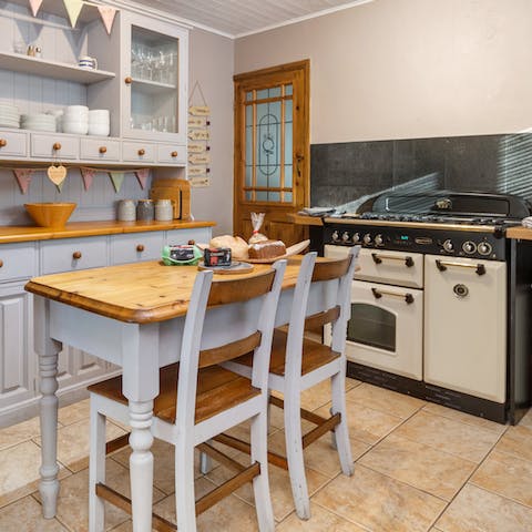 Cook up a storm on the AGA-style stove in the country kitchen
