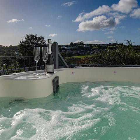 Bubble your troubles away in the hot tub overlooking Saundersfoot