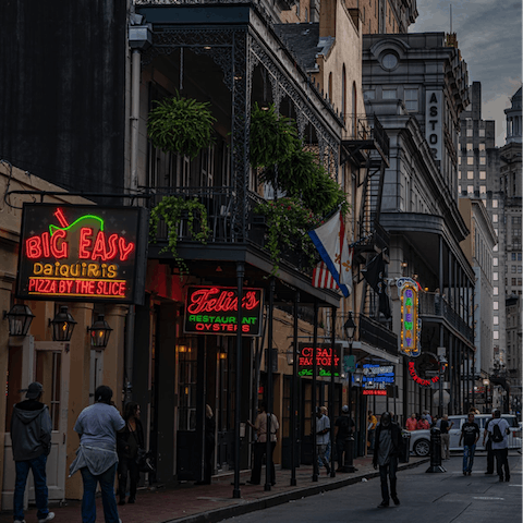 Explore Bourbon Street, just a five-minute drive away from your apartment 