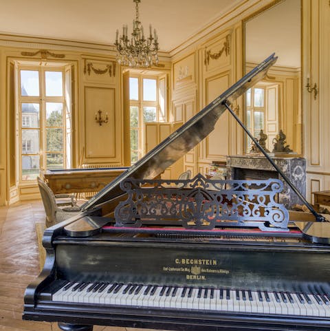 Play your favourite music on the grand piano