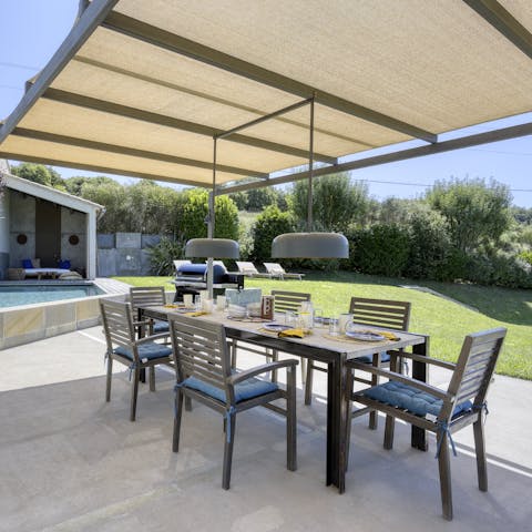 Gather your loved ones under the pergola for an alfresco barbecue
