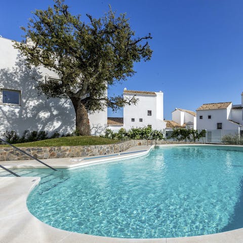 Cool off by diving into the communal swimming pool