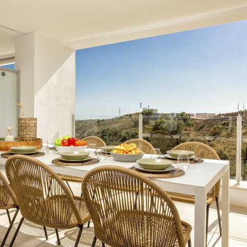 Dine alfresco and admire the mountain views