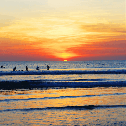 Stroll down to nearby Pantai Batu Belig beach for incredible sunsets
