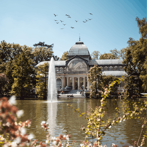 Find serenity from bustling city life by visiting El Retiro Park, less than 2 km away
