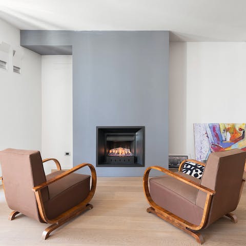 Relax by the contemporary fireplace on chillier evenings