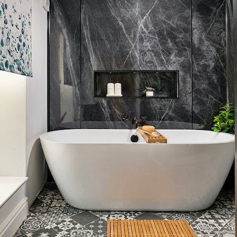 Sink into a hot bath to unwind after a busy day