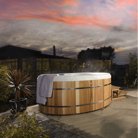 Unwind after a long day with a soak in the hot tub 