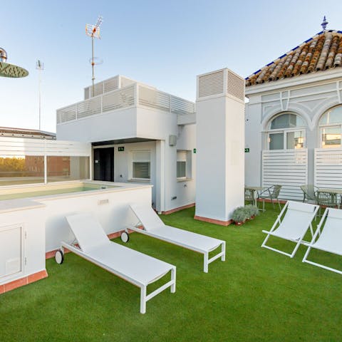 Make use of the building's communal roof deck and swimming pool